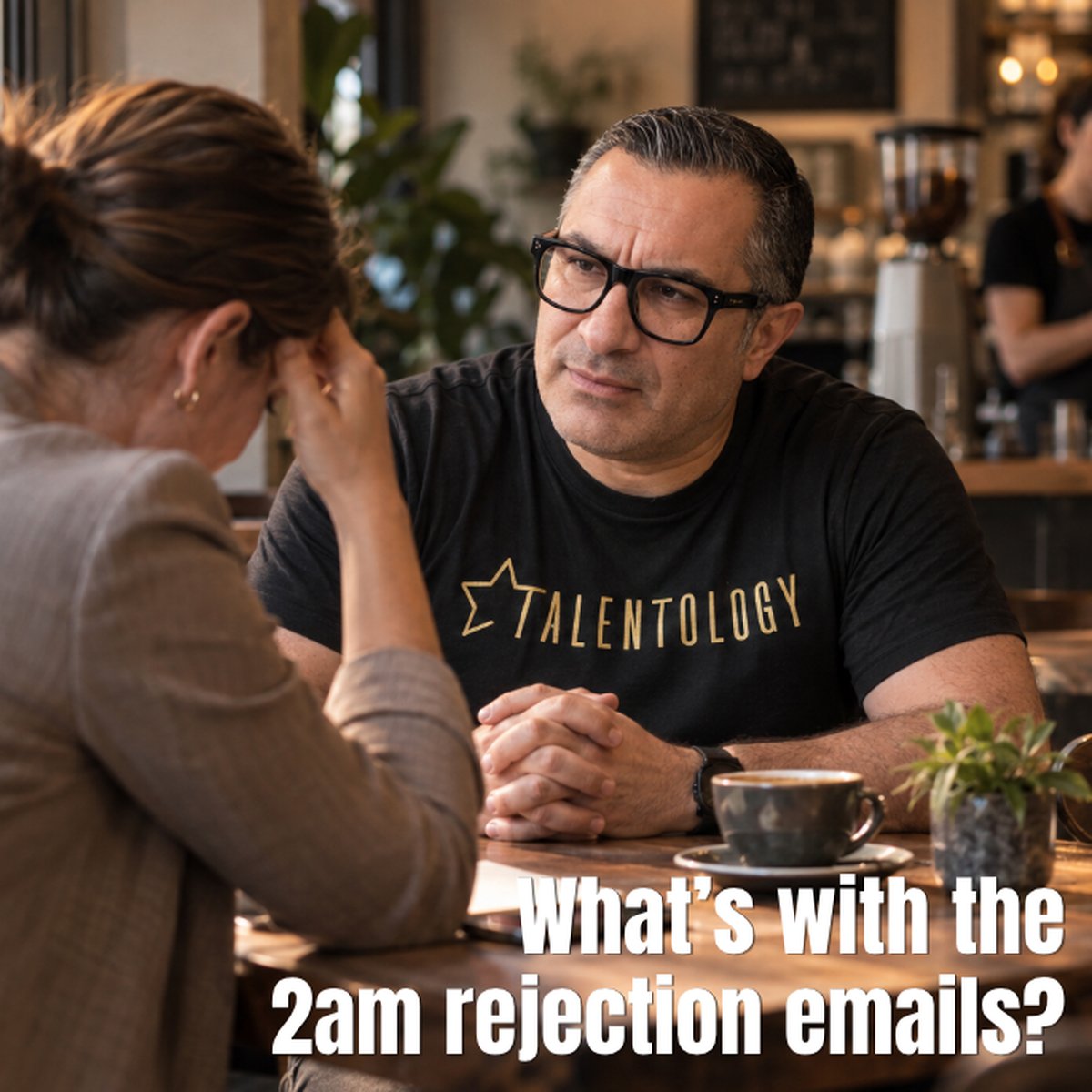 Trevor Churchley at a cafe table listening to a job seeker with her head in her hand, with the words: What's with the 2am rejection emails?